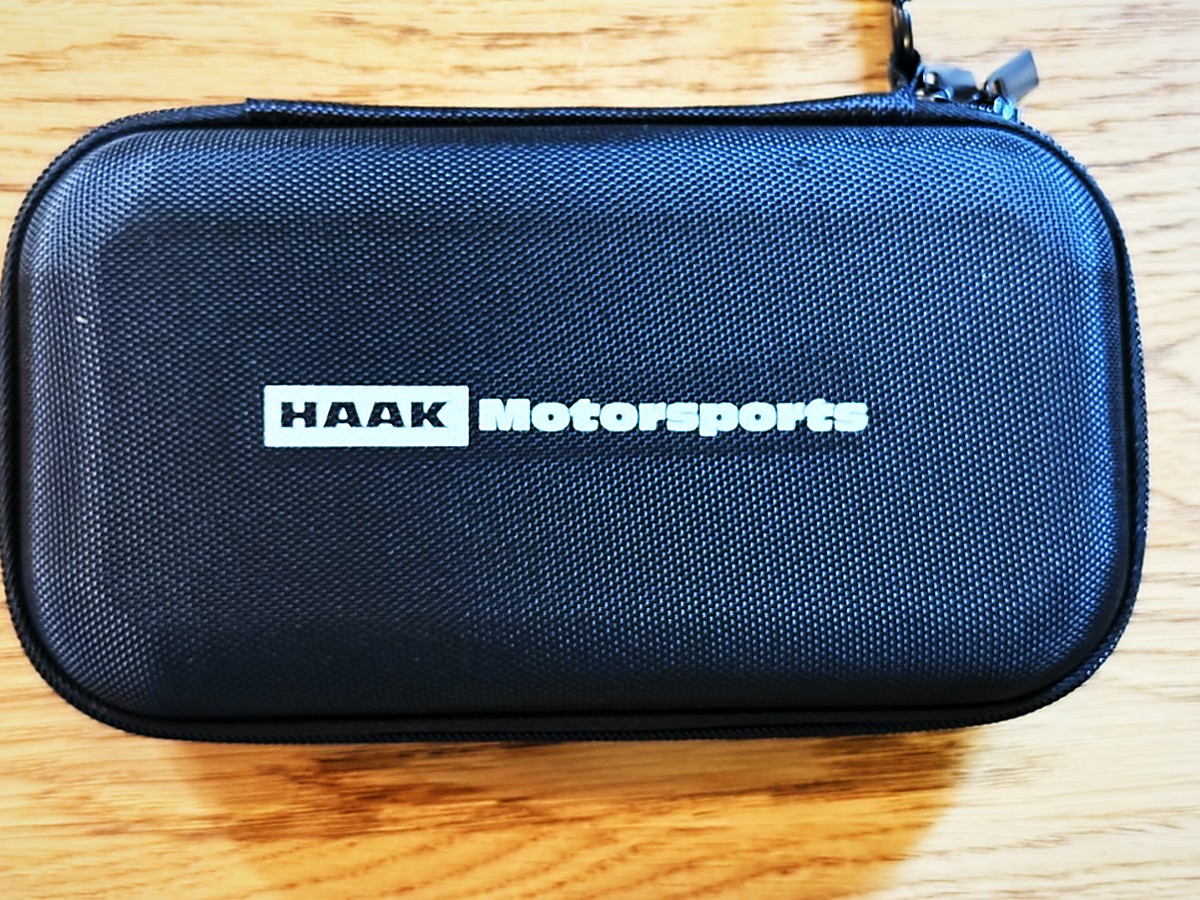 XV Tuner V3 black zip-up hard case with HAAK Motorsports logo